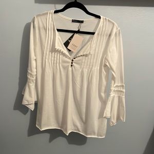Women’s white cotton blend blouse. Mildly boho, very comfy.